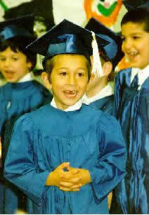 White kindergarten hotsell cap and gown